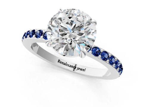 White gold Round Cut Diamond Pavé Engagement Ring with Round with Blue Sapphire side stone Accents and Prong Setting_91