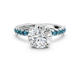 White gold Round Cut Diamond Pave Band Solitaire Ring with Round with Blue Topaz side stone and Prong Setting