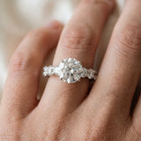 White gold Round Cut Diamond Prong Setting with Side Stones on a Pave Band_167