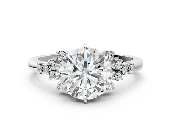 Platinum Round Cut Diamond Ring with Side Stones and Four-Prong Setting
