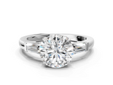 White gold Round Cut Diamond Ring with Tapered Baguette Side Stones in Four-Prong Setting_32