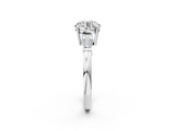 White gold Round Cut Diamond Ring with Tapered Baguette Side Stones in Four-Prong Setting_34