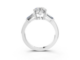 White gold Round Cut Diamond Ring with Tapered Baguette Side Stones in Four-Prong Setting_35