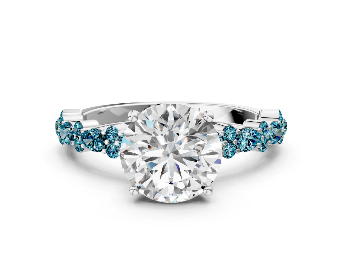 White gold Round Cut Diamond Side Stone Solitaire Ring with Round with Blue Topaz side stone and Four-Prong Setting