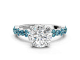 White gold Round Cut Diamond Side Stone Solitaire Ring with Round with Blue Topaz side stone and Four-Prong Setting_138