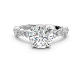 White gold Round Cut Diamond Side Stone Solitaire Ring with Round with Moissanite side stone and Four-Prong Setting