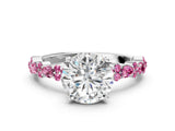 White gold Round Cut Diamond Side Stone Solitaire Ring with Round with Pink Sapphire side stone and Four-Prong Setting