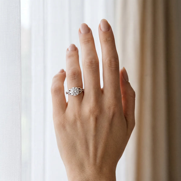 White gold Round Cut Diamond Solitaire Engagement Ring with Celtic Knot Band and Four-Prong Setting