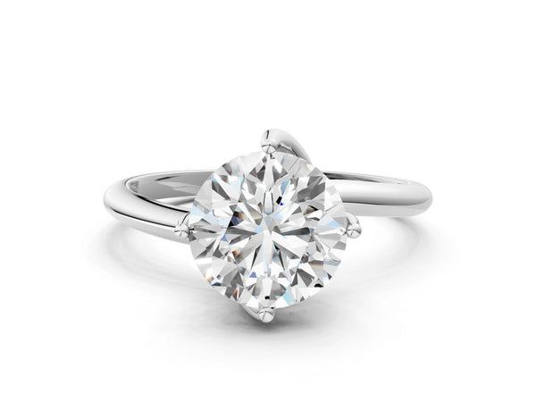 White gold Round Cut Diamond Solitaire Engagement Ring with Four-Prong Setting and Classic Band