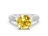 White gold Round Cut Diamond Solitaire Engagement Ring with Pavé Band and Four-Prong Setting