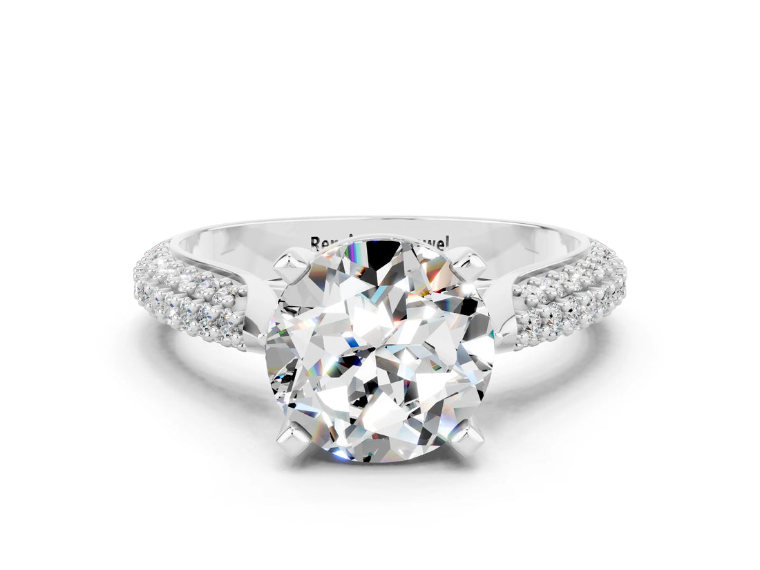 White gold Round Cut Diamond Solitaire Engagement Ring with Pavé Band and Four-Prong Setting