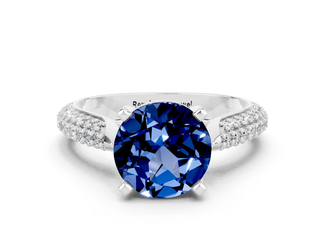 White gold Round Cut Diamond Solitaire Engagement Ring with Pavé Band and Four-Prong Setting