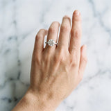 Silver 0.27 Carat D VVS2 Round Diamond Solitaire Engagement Ring with Pavé Band and Four-Prong Setting