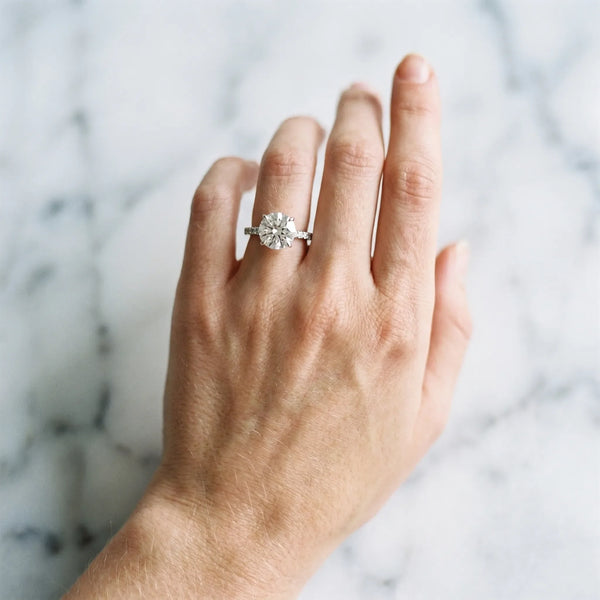 Silver 0.27 Carat D VVS2 Round Diamond Solitaire Engagement Ring with Pavé Band and Four-Prong Setting