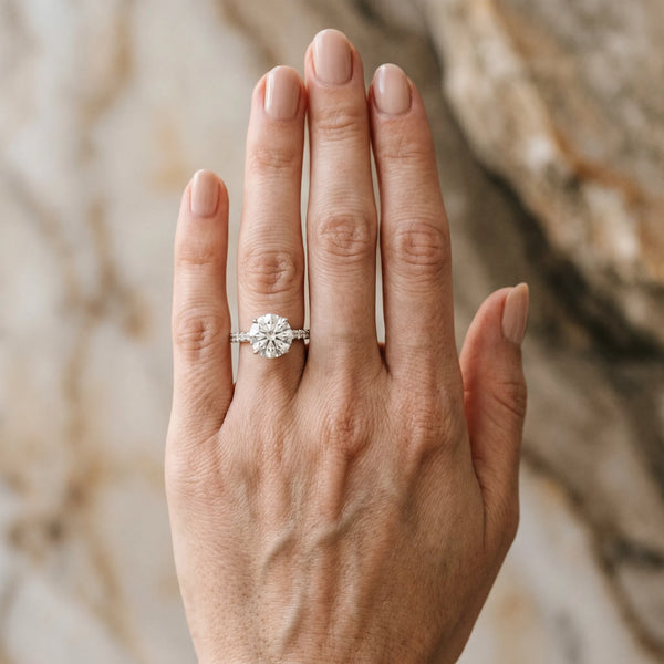 White gold Round Cut Diamond Solitaire Engagement Ring with Round  Pavé Band and Prong Setting