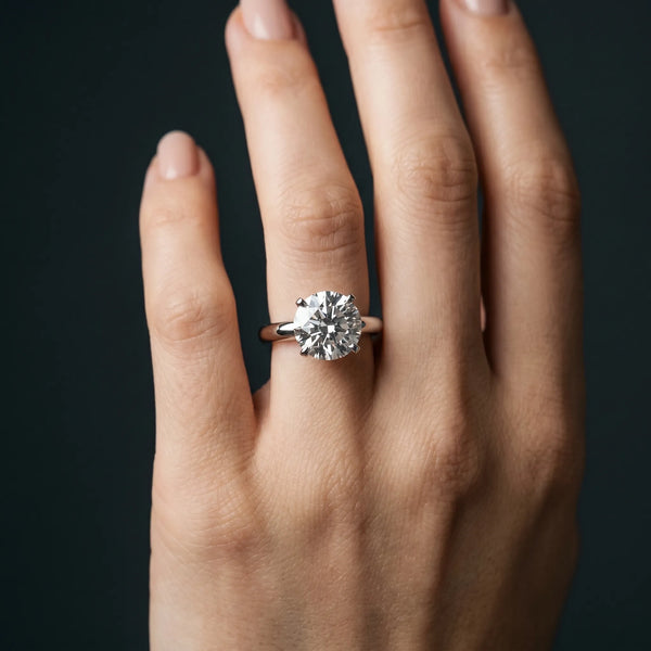 Silver 0.51 Carat F VVS2 Round Diamond Solitaire Engagement Ring with Round Band and Four-Prong Setting