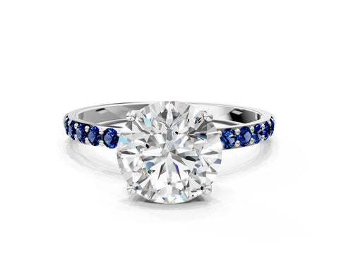 White gold Round Cut Diamond Solitaire Engagement Ring with Round with Blue Sapphire side stone Pavé Band and Prong Setting_48
