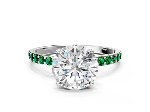 White gold Round Cut Diamond Solitaire Engagement Ring with Round with Emerald side stone Pavé Band and Prong Setting_96