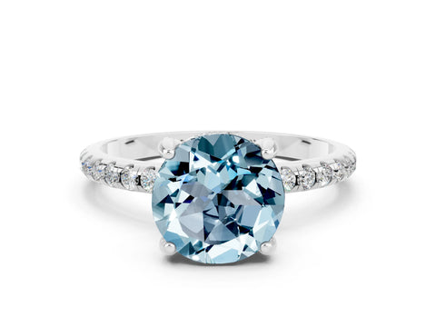 White gold Round Cut Diamond Solitaire Ring with Four-Prong Setting and Pavé Band