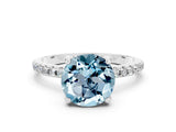 White gold Round Cut Diamond Solitaire Ring with Four-Prong Setting and Pavé Band