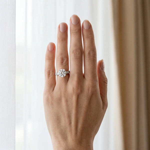 White gold Round Cut Diamond Solitaire Ring with Milgrain Pave Band and Four Prong Setting