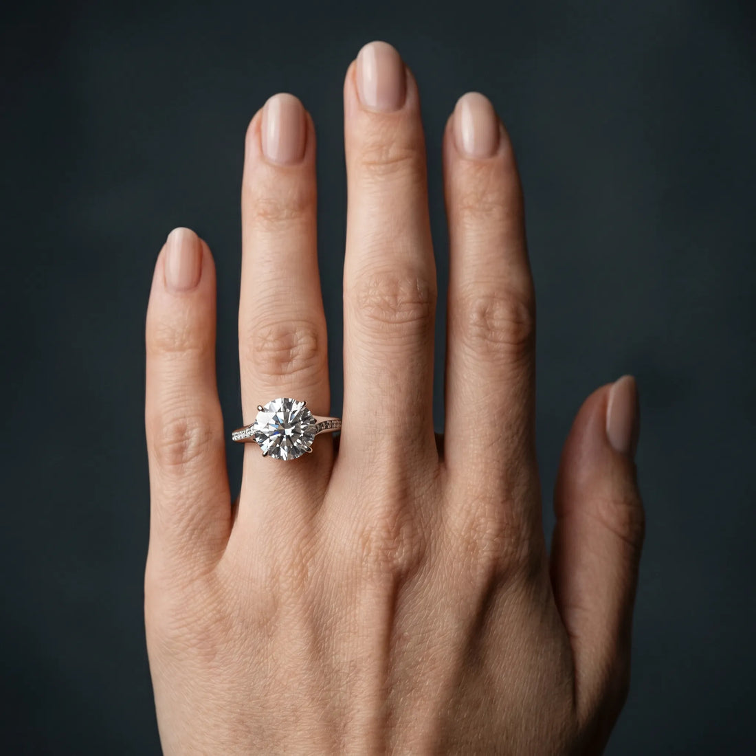 White gold Round Cut Diamond Solitaire Ring with Pavé Band and Prong Setting_133