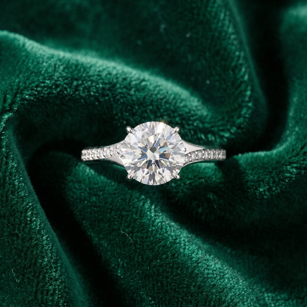 White gold Round Cut Diamond Solitaire Ring with Pavé Band and Prong Setting