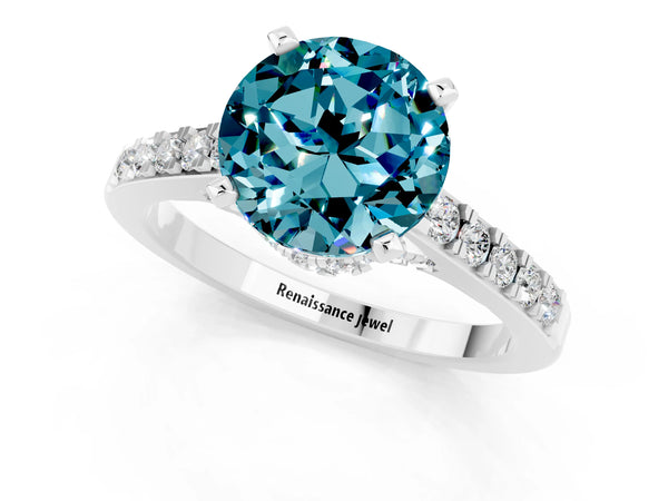 White gold Round Cut Blue Topaz Solitaire Ring with Crossover Gallery and Round  Pavé Band