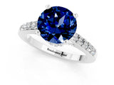 White gold Round Cut Diamond Solitaire Ring with Pavé Band and Prong Setting_1