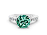 White gold Round Cut Diamond Solitaire Ring with Pavé Band and Prong Setting