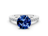 White gold Round Cut Diamond Solitaire Ring with Pavé Band and Prong Setting
