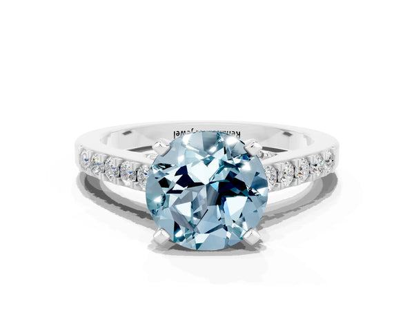 Platinum Round Cut Aquamarine Solitaire Ring with Crossover Gallery and Round  Pavé Band