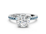 White gold Round Cut Diamond Solitaire Ring with Round with Aquamarine side stone Pavé Band and Four-Prong Setting