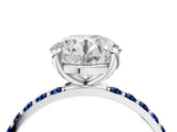 White gold Round Cut Diamond Solitaire Ring with Round with Blue Sapphire side stone Pavé Band and Prong Setting_4