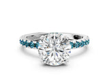 White gold Round Cut Diamond Solitaire Ring with Round with Blue Topaz side stone Pavé Band and Four-Prong Setting