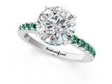 White gold Round Cut Diamond Solitaire Ring with Round with Green Sapphire side stone Pavé Band and Four-Prong Setting_1