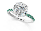 White gold Round Cut Diamond Solitaire Ring with Round with Green Sapphire side stone Pavé Band and Prong Setting_1
