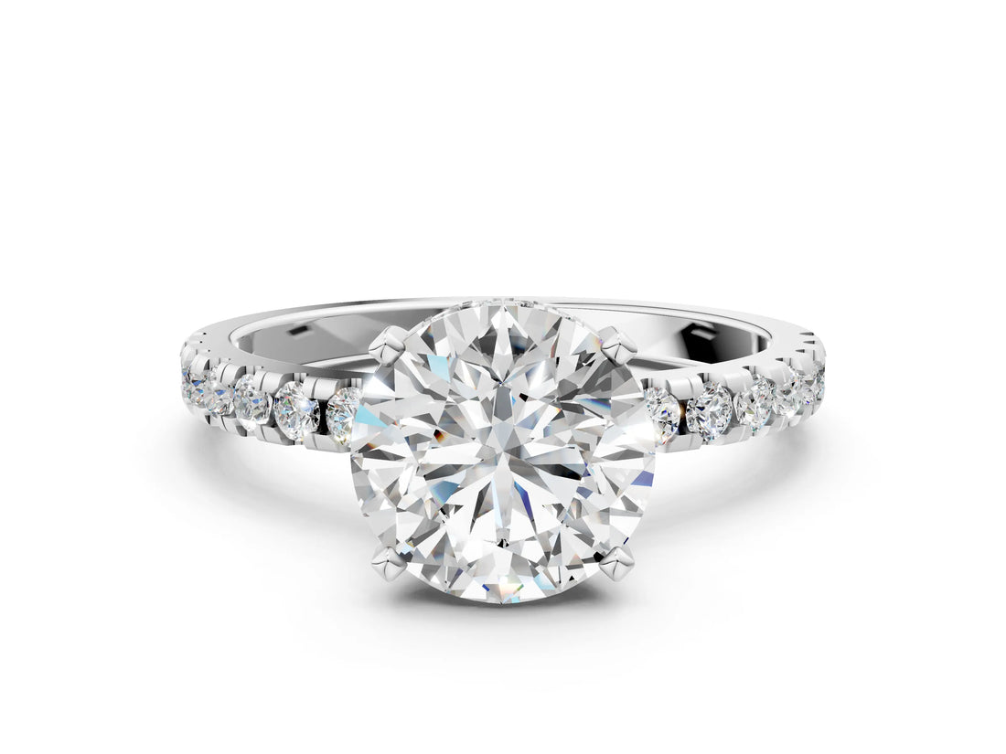 White gold Round Cut Diamond Solitaire Ring with Round with Moissanite side stone Pavé Band and Four-Prong Setting_36