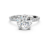 White gold Round Cut Diamond Solitaire Ring with Round with Moissanite side stone Pavé Band and Prong Setting