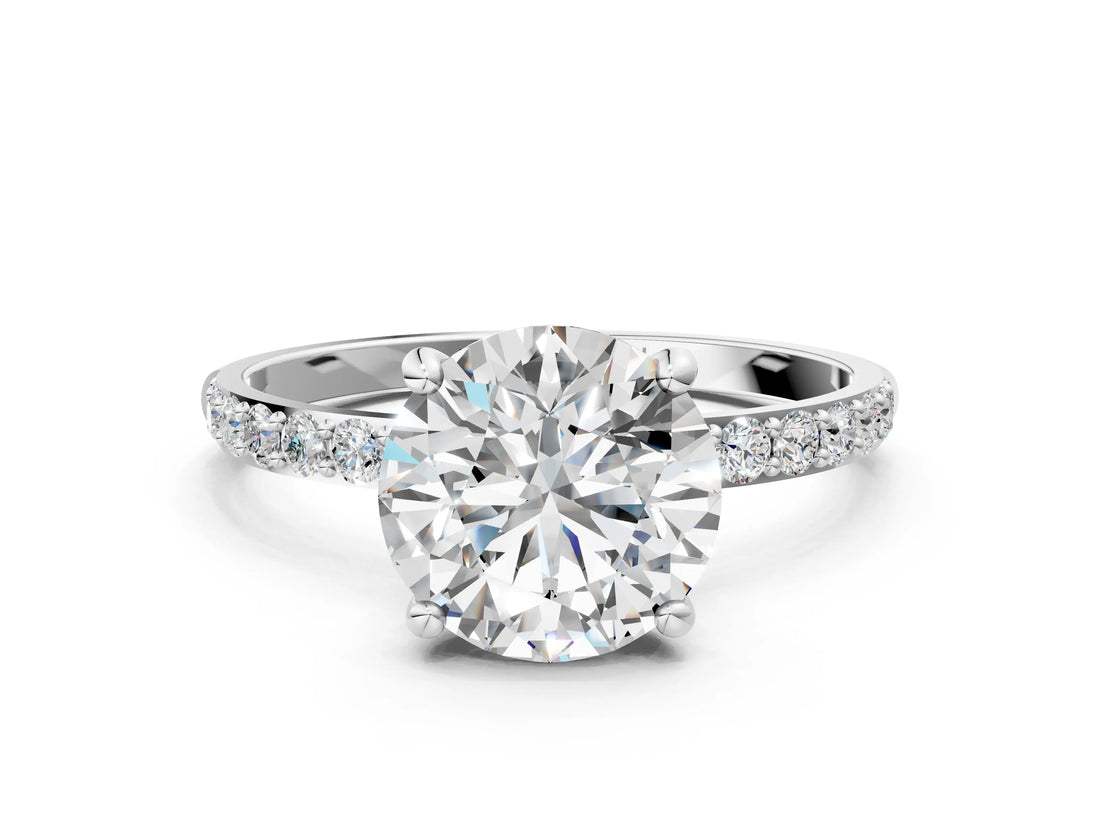 White gold Round Cut Diamond Solitaire Ring with Round with Moissanite side stone Pavé Band and Prong Setting