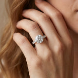 White gold Round Cut Diamond Solitaire Ring with Shared Prong Pavé Band and Four-Prong Setting_126