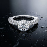 White gold Round Cut Diamond Solitaire Ring with Shared Prong Pavé Band and Four-Prong Setting_127