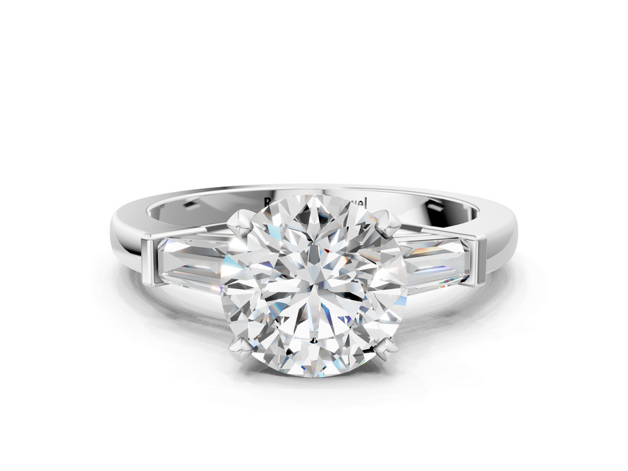 White gold Round Cut Diamond Solitaire Ring with Tapered Baguette Accents and Four-Prong Setting