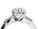 White gold Round Cut Diamond Solitaire Ring with Tapered Baguette Accents and Four-Prong Setting_91