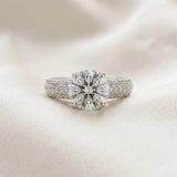 White gold Round Cut Diamond Solitaire Ring with Three-Row Pavé Band and Four-Prong Setting_94