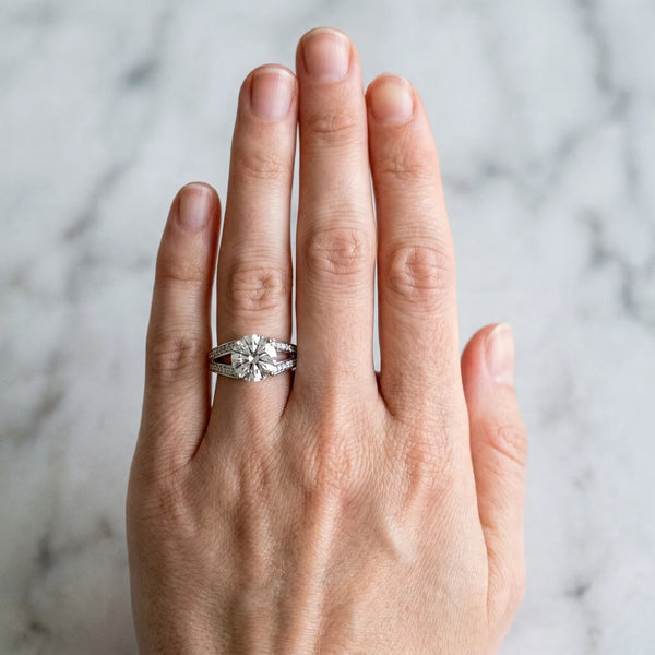 White gold Round Cut Diamond Split Shank Ring with Pavé Band and Four-Prong Setting