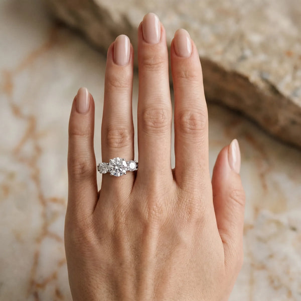 14K White Gold 3.00 Carat E VS1 Round Diamond Three-Stone Ring with Channel Set Band and Four-Prong Setting