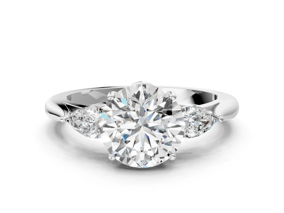 White gold Round Cut Diamond Three-Stone Ring with Pear Side Stones and Four-Prong Setting_76