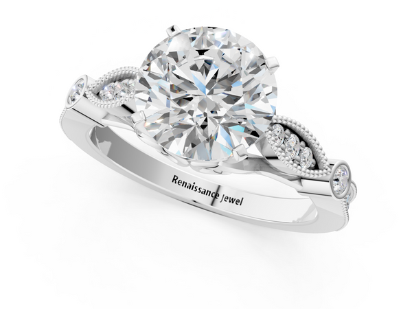 White gold Round Cut Diamond with Milgrain Marquise and Bezel Accents on a Solitaire Band with Prong Setting