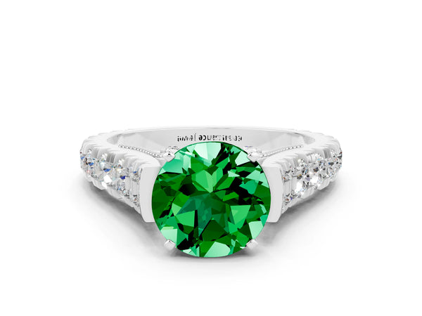 Platinum Round Cut Emerald Classic Solitaire Ring with Pavé Band and Four-Prong Setting